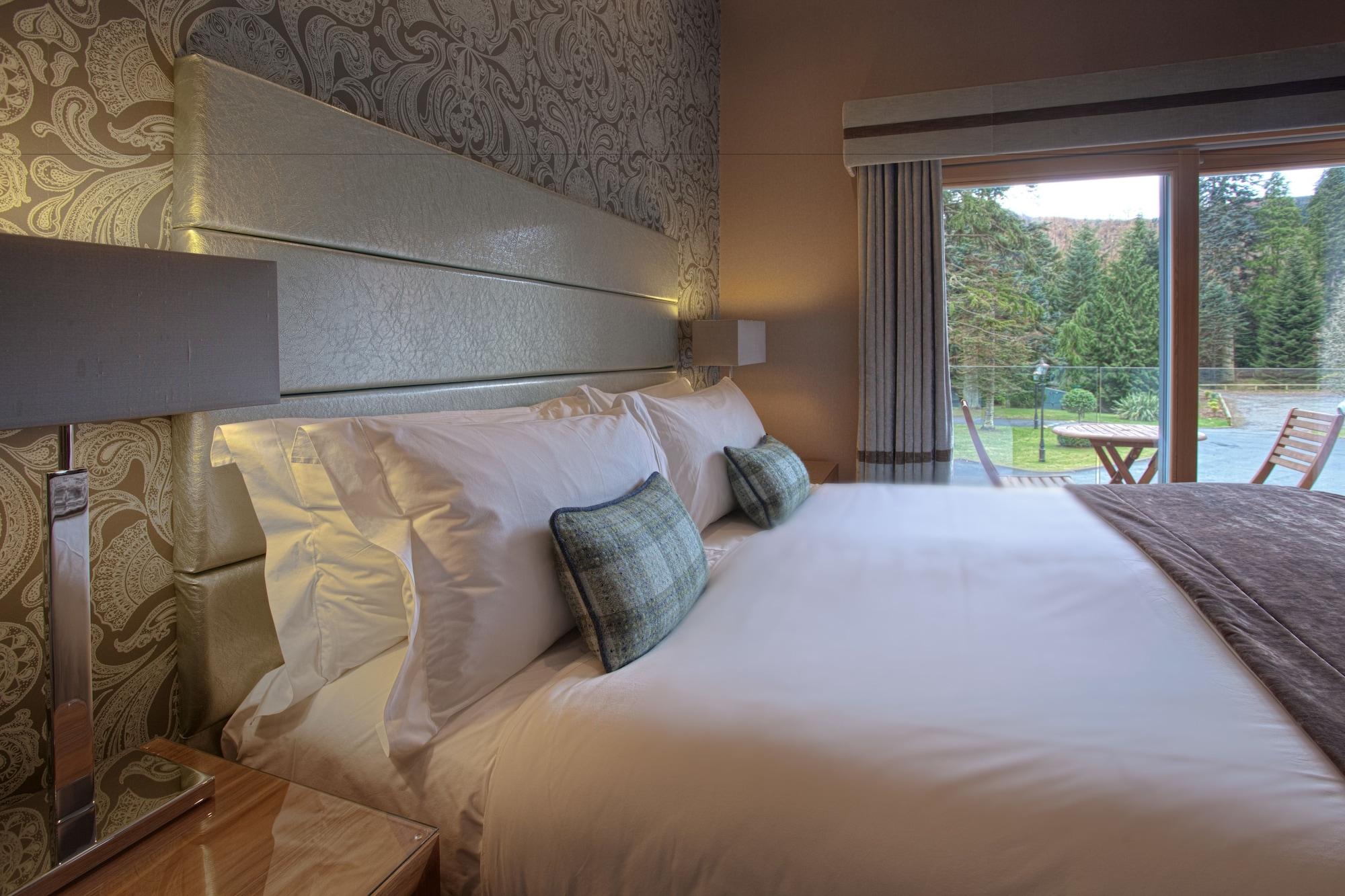 Fonab Castle Hotel Pitlochry Esterno foto A bedroom at the hotel