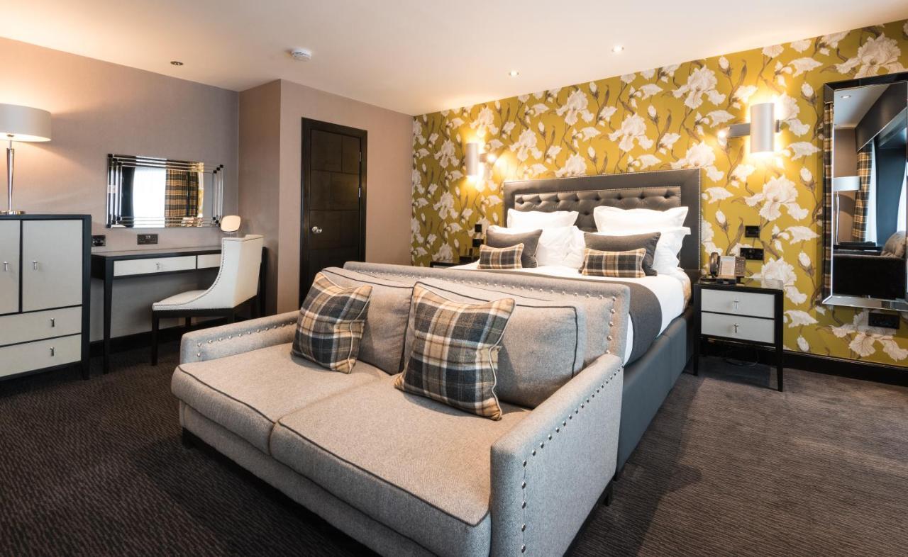 Fonab Castle Hotel Pitlochry Esterno foto A bedroom at The Arden